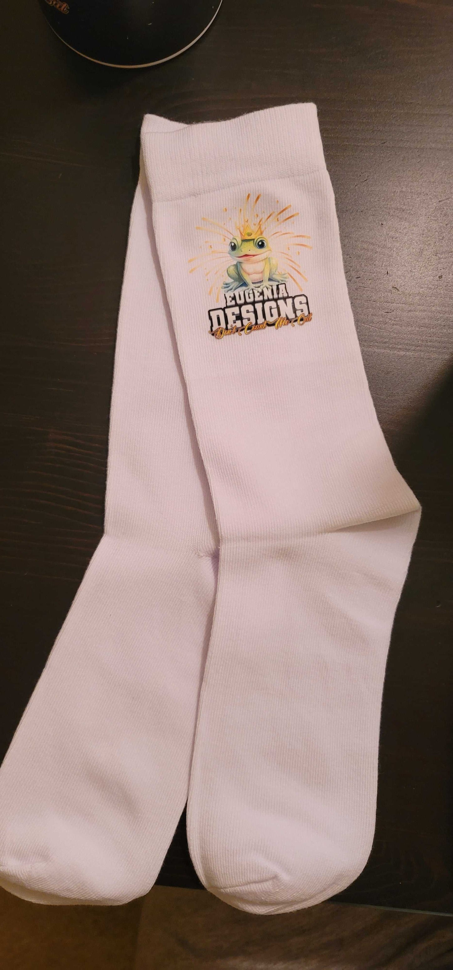 White Eugenia Designs Logo Socks featuring colorful pineapple graphic for ultimate comfort and style.